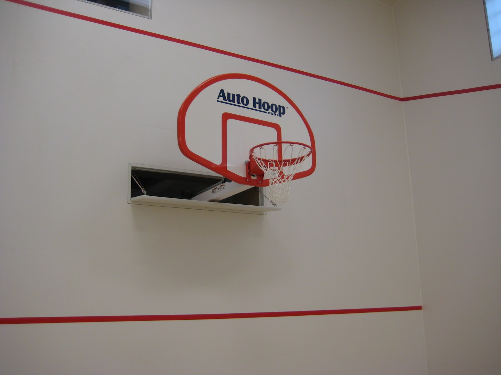 Auto Hoop hidden basketball hoop